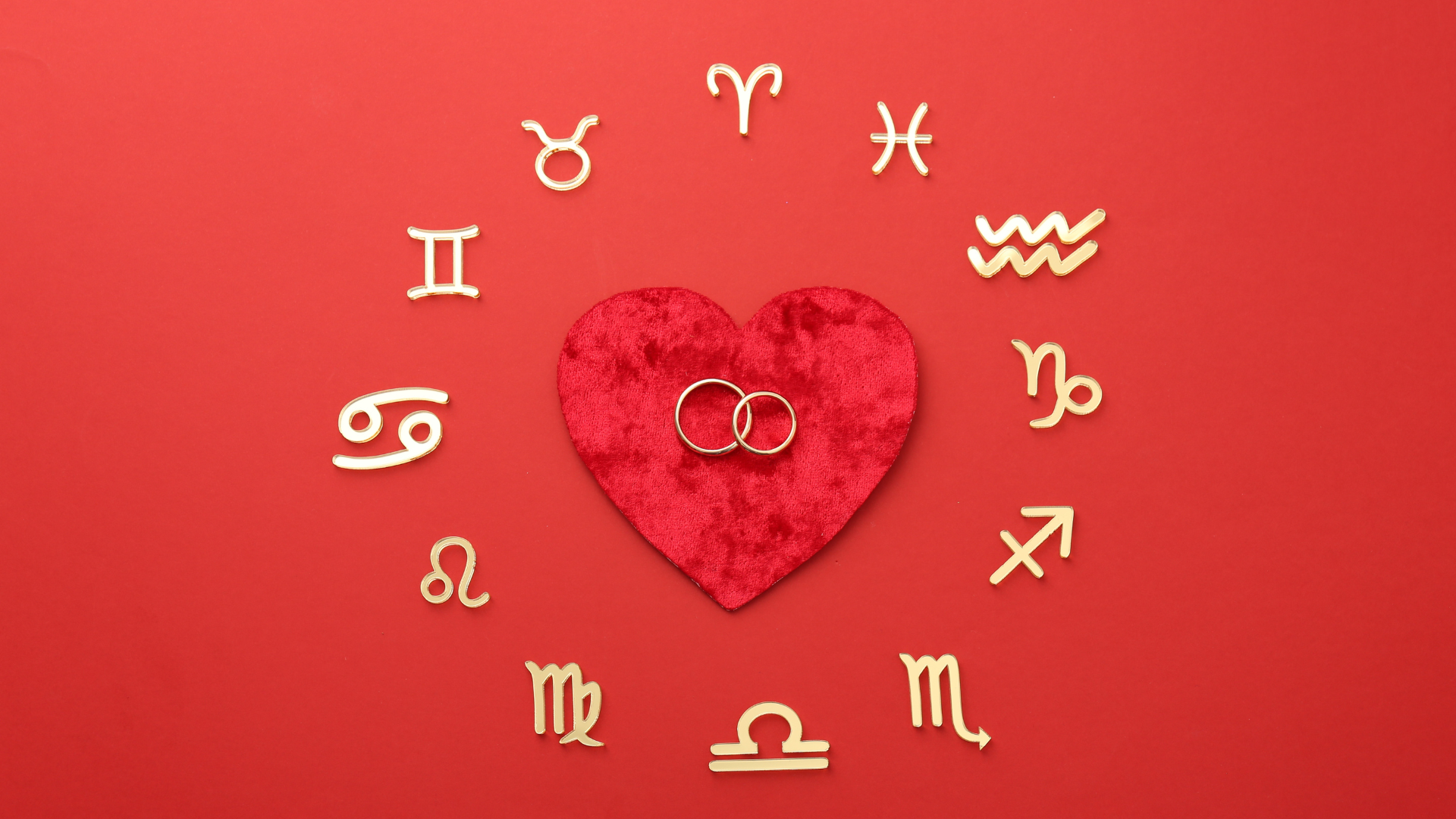 Coeur rouge avec deux alliances et entouré des signes astrologiques